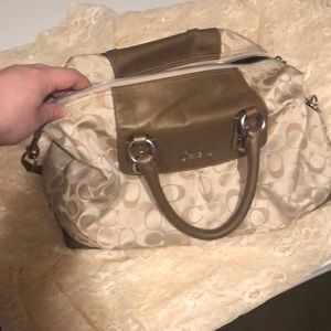 Beautiful coach handbag cream and tan color